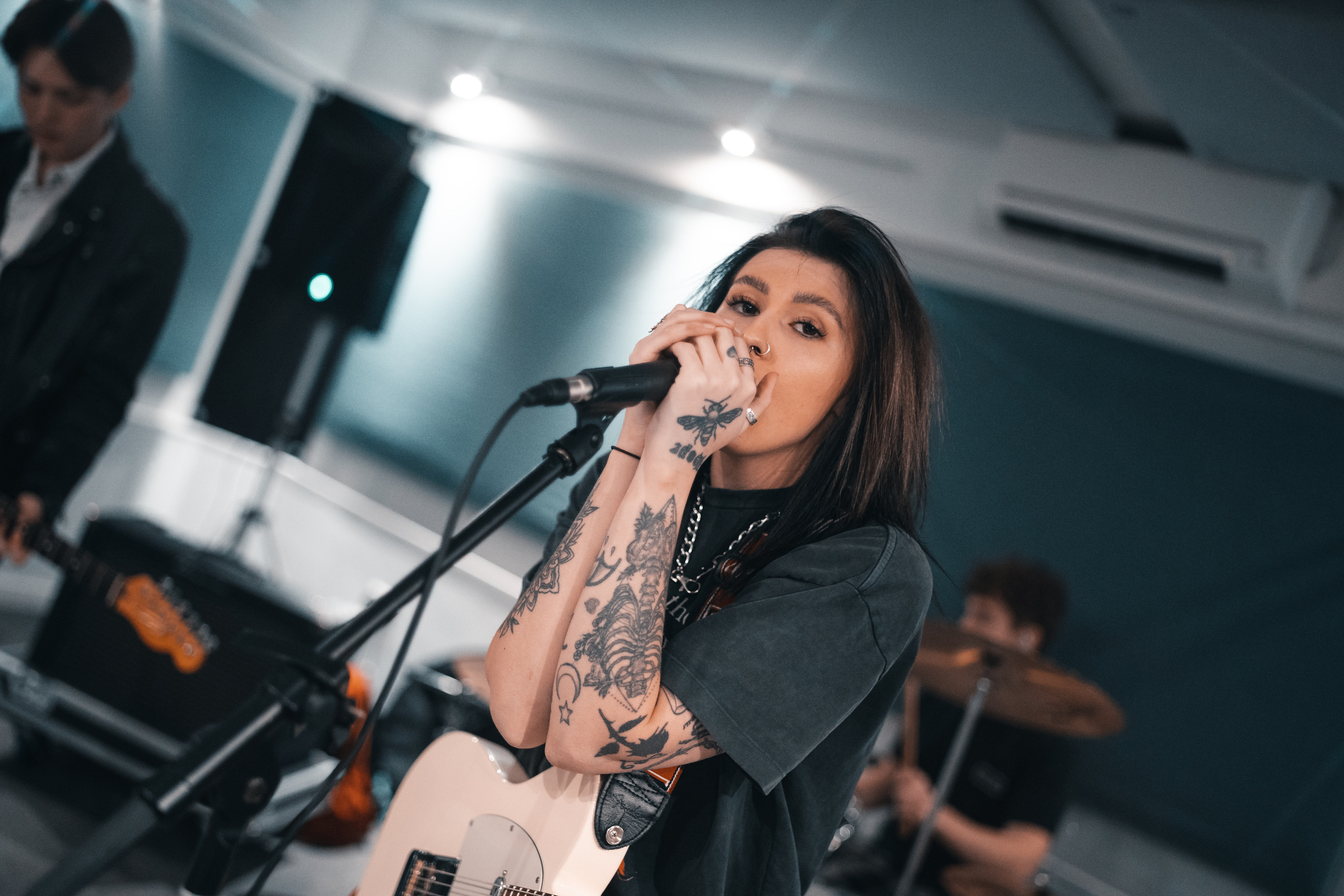 Woman in Black Shirt Singing